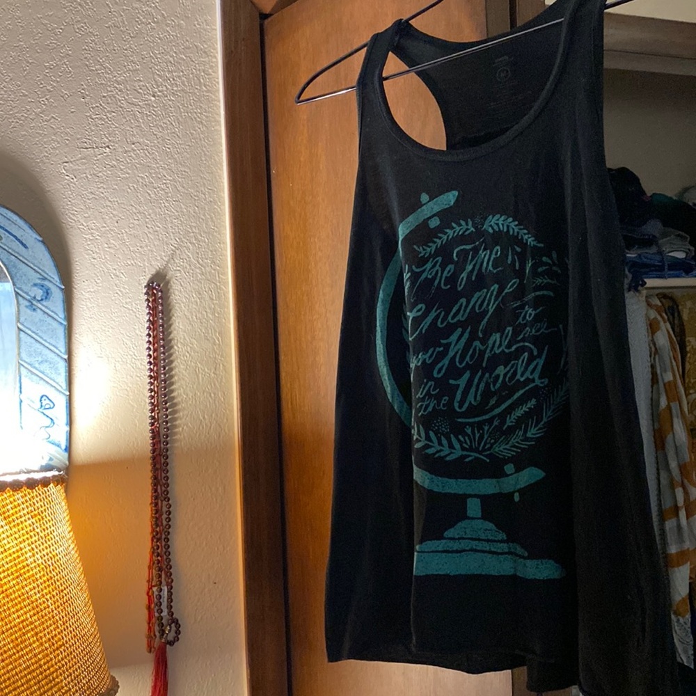 Be the change you hope to see in the world. Size medium t-shirt